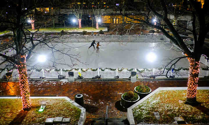 Edwin Jackson of Oregon and  Ayla Thompson of Toledo ice skate at One SeaSkate Ice Rink in Toledo.